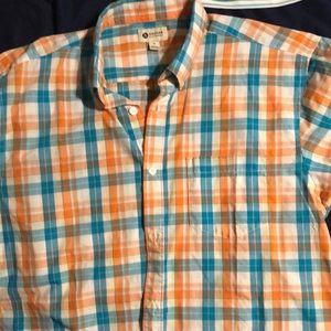 Orange and blue plaid shirt.